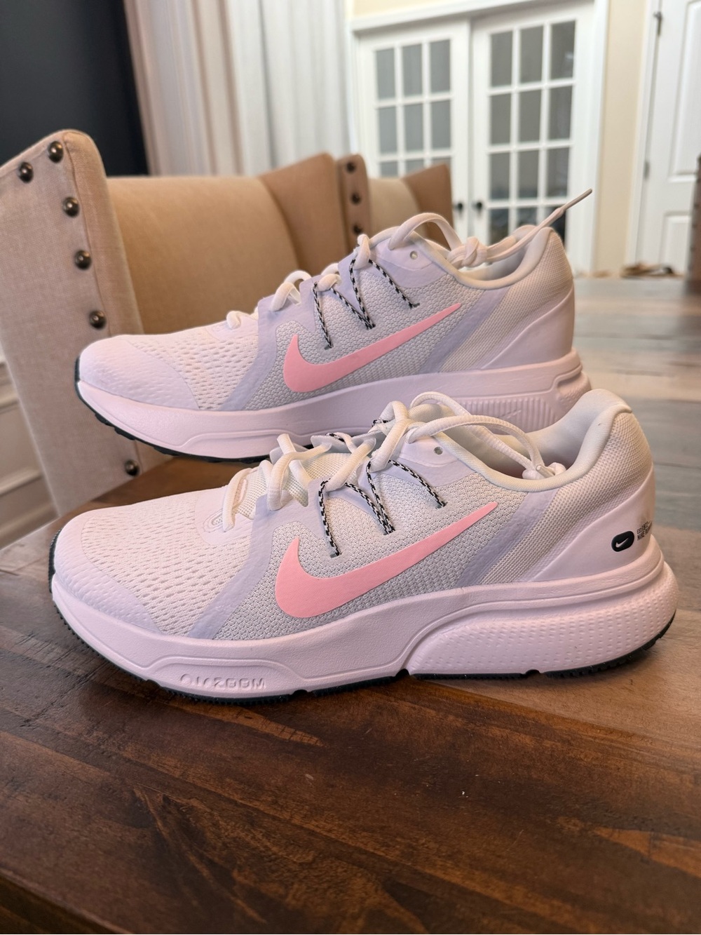 Nike White Athletic Sneakers with Pink Swoosh